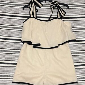 Chic Cream Jumpsuit with Black Trim